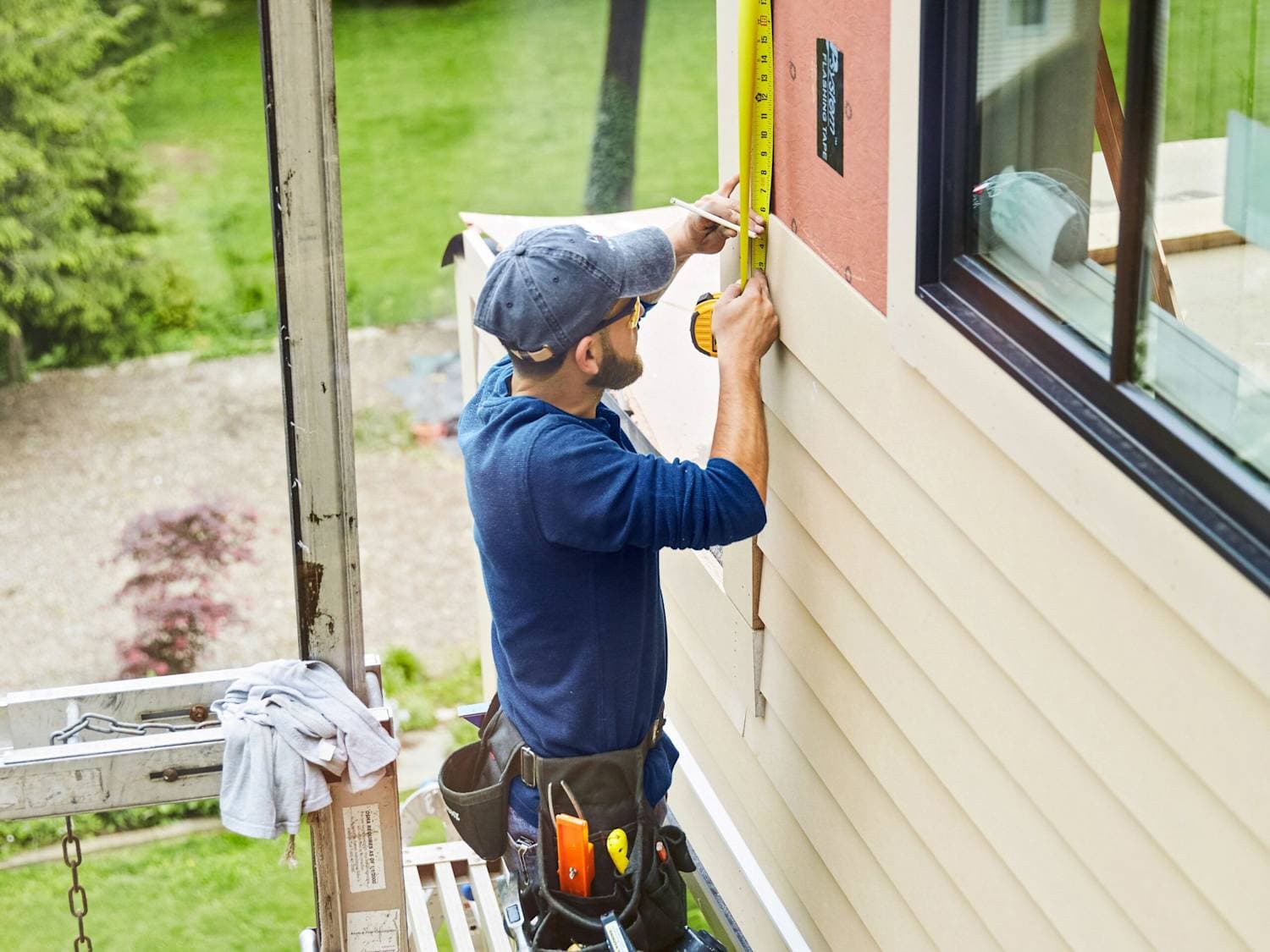 Modern home exterior with new siding installation