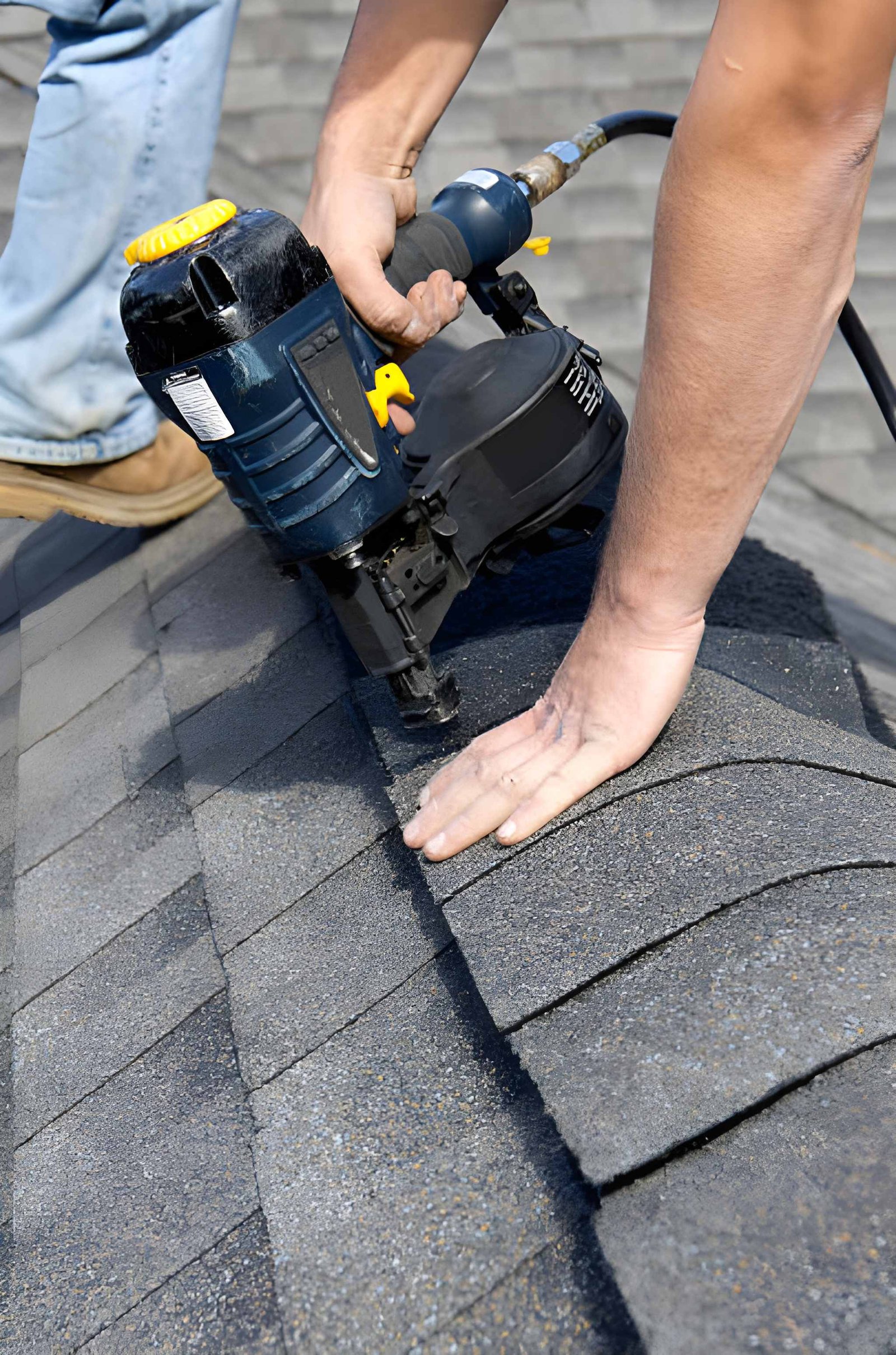 Roofing contractors installing shingle roofs